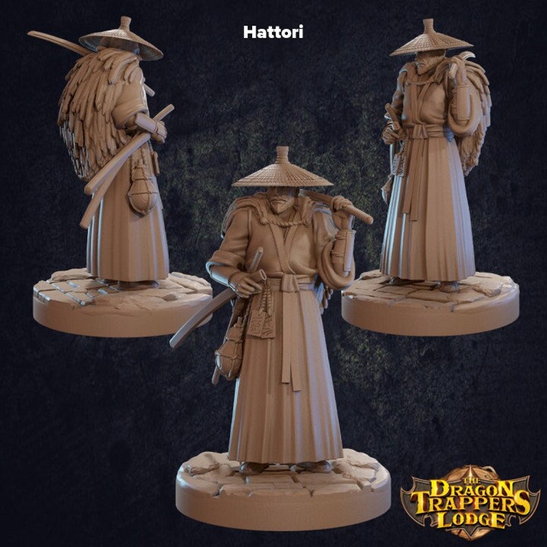 May include: A painted miniature figurine of a character named Hattori, wearing a straw hat and a long robe, holding a sword and a bag. The figurine is standing on a circular base with a textured surface. The text "The Dragon Trappers Lodge" is visible in the lower right corner of the image.
