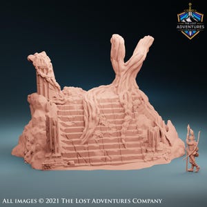 May include: A detailed, light brown miniature terrain piece depicting a crumbling staircase and a large tree with exposed roots. The model includes architectural ruins and is accompanied by a miniature figure with a bow and arrow. The Lost Adventures Company logo is in the upper right corner.