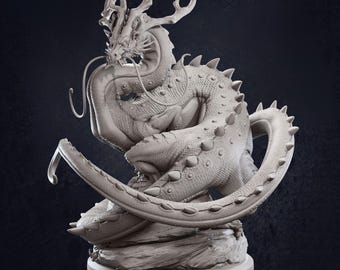 May include: A detailed, gray, sculpted figurine of a dragon curled up with its tail wrapped around its body. The dragon has horns, scales, and a long snout.