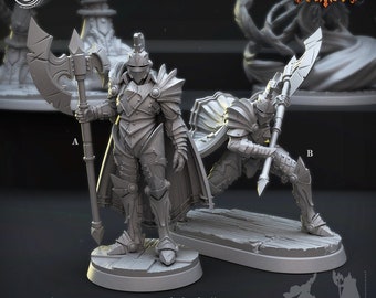 Puede incluir: Dos figuras en miniatura de plástico gris de caballeros con armadura, una de pie y otra de rodillas, ambas sosteniendo hachas. Las figuras están sobre bases redondas con una superficie texturizada. El texto "Midnights 496" está impreso debajo de las figuras.