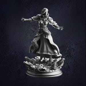 May include: A detailed, grayscale figurine of a woman in a flowing gown and armour, posed with outstretched arms. The figure stands on a rocky base, with intricate details in the clothing and facial features. The background is a dark, textured gradient.