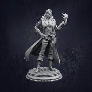 May include: A detailed gray figurine of a female character in a fantasy outfit. She wears a long coat, corset, and pants, with a blindfold over one eye. The figure stands on a wooden platform and holds a stylized object in her hand.