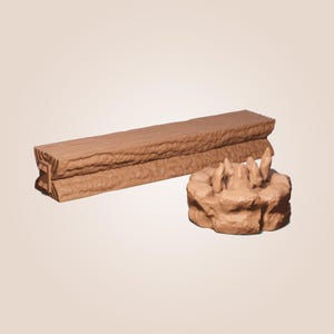 May include: A brown wooden log with a rough texture and a small, round, brown rock formation with pointed edges.