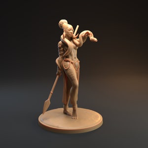 May include: A brown figurine of a woman holding a snake in her right hand. She is wearing a beaded necklace and a skirt with a beaded belt. She is standing on a round base.