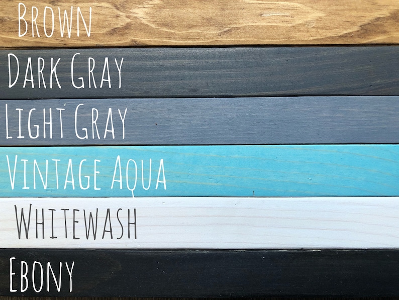May include: Six wood samples stained in different colors: brown, dark gray, light gray, vintage aqua, whitewash, and ebony.