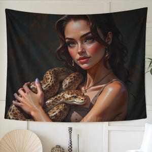 May include: A tapestry depicting a woman with long brown hair and a snake wrapped around her. The snake has a brown and tan spotted pattern. The woman is wearing a brown dress and jewellery. The background is dark with hints of foliage.