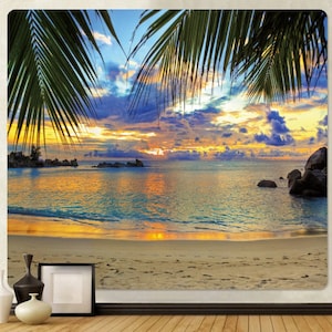 May include: A tropical beach scene with palm trees, a sandy beach, and a blue ocean with a colorful sunset in the background.