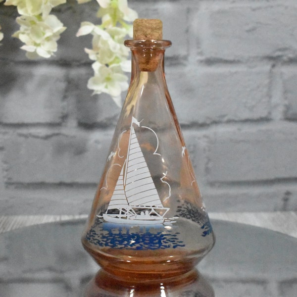 Vintage Slightly Amber/Orange Colour Glass Decanter with Ships Pattern and Cork Stopper