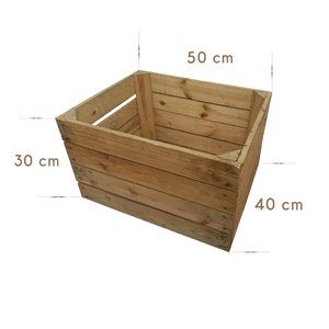 May include: A rectangular wooden crate with visible grain and natural light brown tones. The crate features horizontal slats and corner supports. Text labels indicate dimensions of 50 cm in length, 40 cm in width, and 30 cm in height.