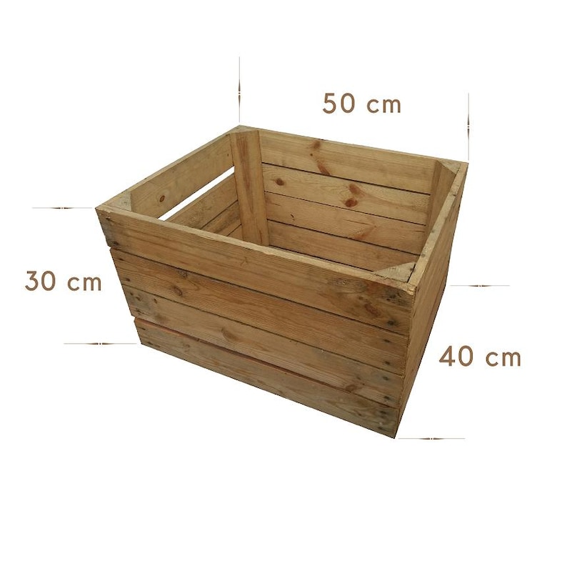 May include: A wooden crate with dimensions of 50 cm x 40 cm x 30 cm. The crate is constructed from light brown planks of wood, with visible grain and knots. The open top allows for easy access and storage.