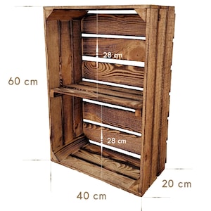 May include: A rustic wooden crate with a shelf, measuring 40 cm wide, 20 cm deep, and 60 cm tall. The shelf is 28 cm from the top and bottom. The crate is made of brown wood with visible grain.