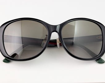 Gafas de sol Gucci vintage, logo GG, a rayas