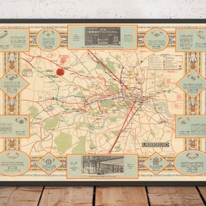 May include: A framed vintage map of the London Underground, showing the tube network with colored lines. The map has decorative borders and text elements, with a cream and orange colour scheme. The map is enclosed in a black frame.