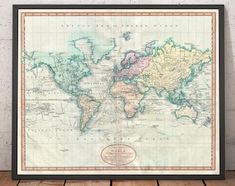 May include: A vintage world map printed on paper with a black frame. The map is in shades of green, blue, yellow, and pink. The map shows the continents of North America, South America, Europe, Asia, Africa, and Australia. The map is titled "New Chart of the WORLD."