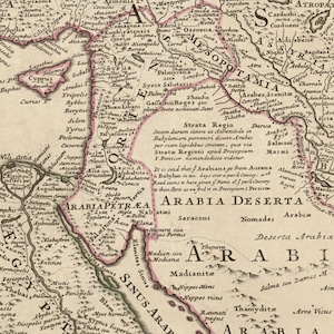 May include: An antique map of the Middle East, showing the regions of Arabia, Mesopotamia, and Persia. The map is printed in black and white on a cream-colored background. The map is labeled with the names of various cities, regions, and geographical features.