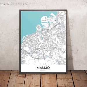 May include: A black and white map of Malmö, Sweden, with a light blue background. The map shows the city's streets, parks, and waterways. The text "MALMÖ" and "SWEDEN" is printed below the map.