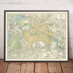 May include: A vintage map of Berlin, Germany, printed in black, white, and shades of green and yellow. The map shows the city's streets, parks, and waterways. The title of the map is "Plan der Stadt Berlin 1:10,000."