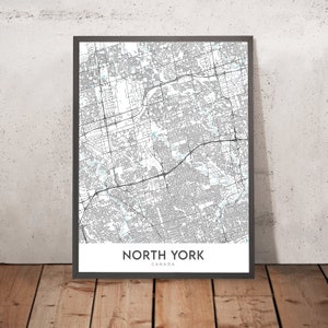 Könnte beinhalten: Ein Schwarzweiß-Kartenabdruck von North York, Kanada, in einem schwarzen Rahmen. Die Karte zeigt die Straßen und Wege der Stadt.