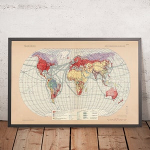 May include: A vintage world map showing surface communications and time zones. The map is printed on cream-colored paper and features a grid pattern with lines of longitude and latitude. The map is framed in a dark brown frame.