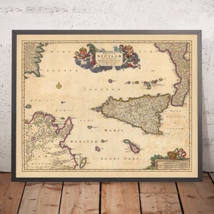 May include: An antique map of Sicily, Italy, with a decorative border and text in Latin. The map is printed on aged paper with a cream background and features a detailed depiction of the island's geography.