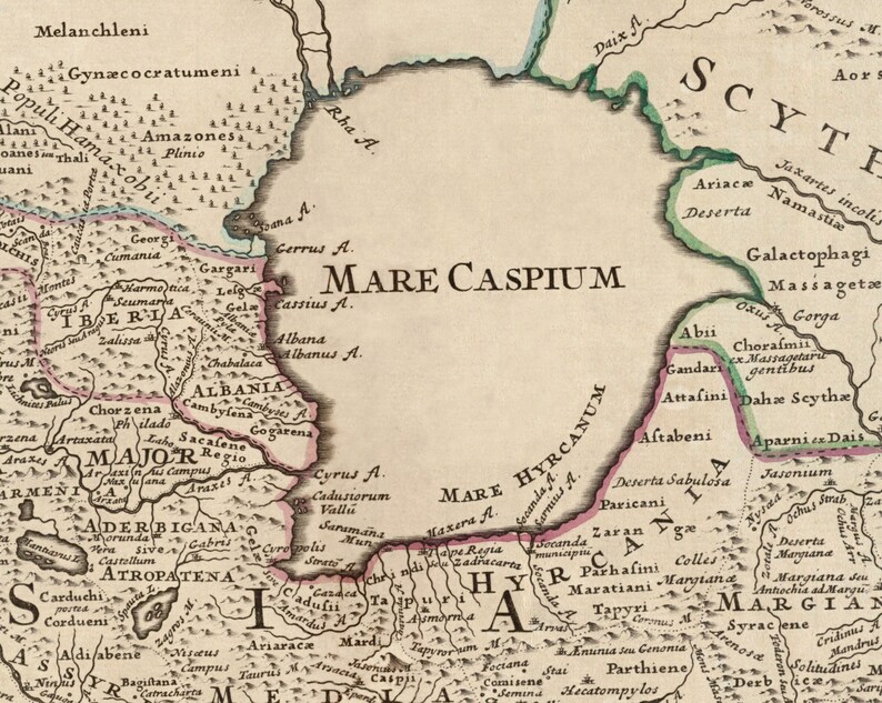 May include: An antique map of the Caspian Sea and surrounding regions, with detailed geographical features and names of ancient civilizations, including the Scythians, Albanians, and Armenians. The map is printed in black and brown ink on a cream-colored background.
