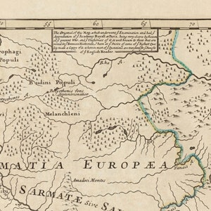 May include: A vintage map of Europe, showing the location of various tribes and peoples, including the Androphagi, Budini, and Melanchleni. The map is drawn in a detailed style with a light brown background and black text. The text "The Orignal of this Map which underwent Examination and had Approbation of the Academy Royal at Paris, being very scarce and had if it's printing been Master of it's Doctrine well known to those that are good in Roman History, I have set it as of some of it's highest are by made a Copy of, whom most of Doctrine are wonderfully shamefull of a English Reader." is included in a box at the top of the map.