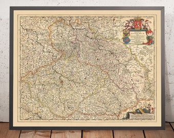 Puede incluir: Un mapa antiguo de Bohemia, una región de Europa Central, con fronteras detalladas y texto en alemán. El mapa está enmarcado en un marco de madera oscura y tiene un fondo de color crema.