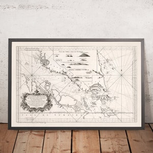 May include: A vintage black and white map of the Straits of Malacca, Singapore, and the Island of Sumatra. The map is titled "Carte Reduite des Detroits de Malacca, Singapour, et de l'Isle de Sumatra".