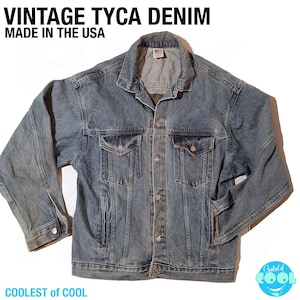 May include: Vintage Tyca Denim jacket, made in the USA. The jacket is a light blue denim with a faded look. It has a button-up front, two chest pockets, and two front pockets.