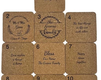 May include: Ten cork coasters with various sayings and designs. The coasters are square and have a natural cork finish. The sayings include "Kindness Over Everything", "We Decided On Forever", "The Greene Family", "The Best Things In Life Are Each Other", "Love Makes A House A Home", "Bless Our Home The Greene Family", "Happy Times Together", "Enjoy The Little Things", "The Greene Home Is Our Happy Place", and "Little Moments Big Memories".