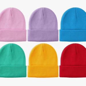 May include: Six different colored knit beanies. The beanies are in the colors pink, purple, blue, green, yellow, and red.