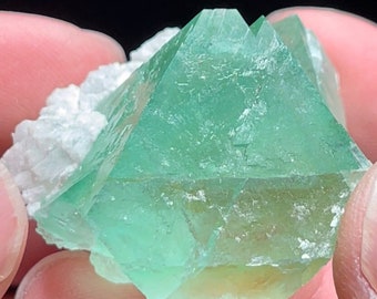 Aesthetic Green Fluorite From Riemvasmaak South Africa with traces of white calcite.