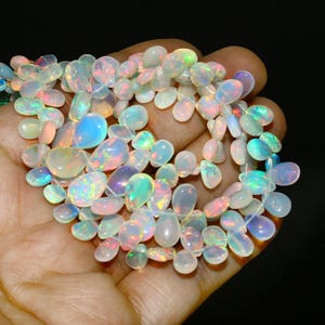 Äthiopische Opal Brioletten: Facettierte Edelsteinperlen, 17 Zoll Strang