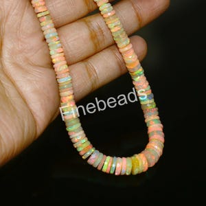 AAA Ethiopian Opal Beads: Faceted Rondelle Tyre, 17 Inch Strand