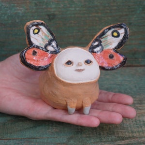 Handmade Ceramic Butterfly Figurine: Unique Clay Sculpture