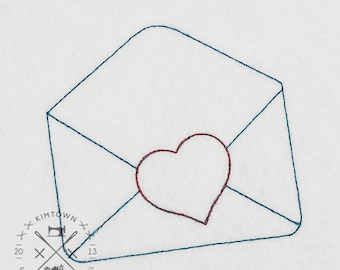 May include: A blue embroidered envelope with a red heart inside. The envelope is stitched with a blue thread and the heart is stitched with a red thread. The image includes the text "KIMTOWN EMBROIDERY, SEWING & VINYL kimtown.com 20  13"