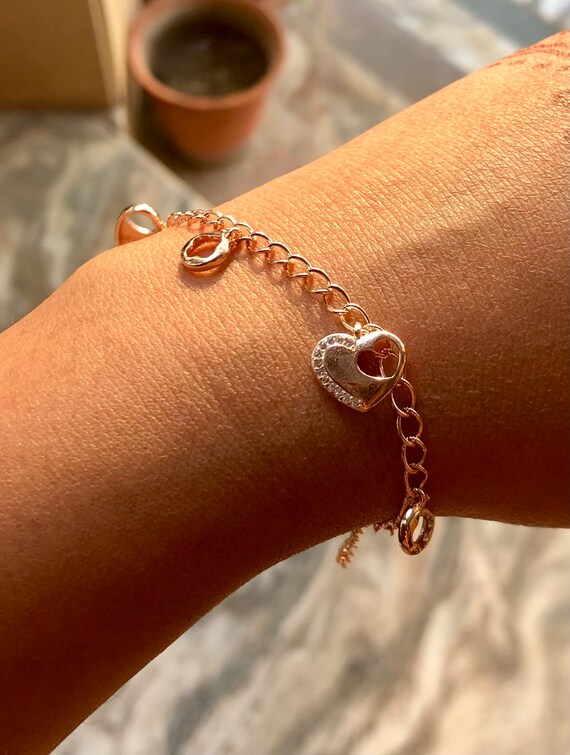 Gold-plated Sterling Circle with Cubic Zirconia on Brown Cord Double Strand Adjustable Bracelet Gold-plated Sterling Circle with Cubic Zirconia on Brown Cord Double Strand Adjustable Bracelet