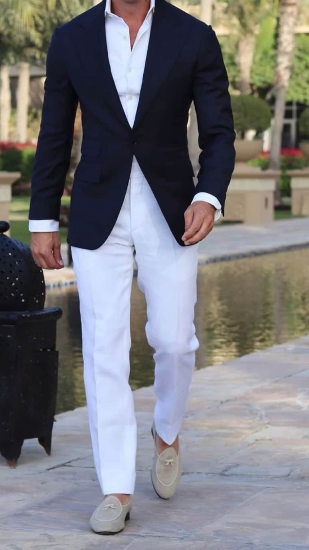 black tuxedo jacket white pants