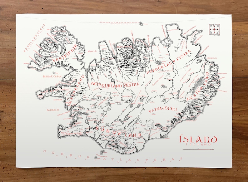 May include: A white map of Iceland featuring black topographical mountain illustrations and red text labels for regions and cities. The map includes a compass rose in the top right corner and the title &Iacute;SLAND ICELAND in the bottom right corner.
