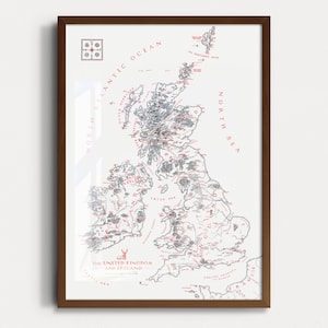May include: A framed map of the United Kingdom and Ireland, with a detailed illustration in grey and red. The map is set against a white background and enclosed in a brown wooden frame. The text "The United Kingdom and Ireland" is visible.