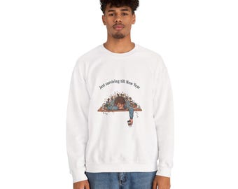 Sudadera sobreviviendo hasta Año Nuevo / memes de agotamiento por vacaciones, festivo pero cansado