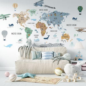 May include: A colorful world map wall decal with illustrations of animals, airplanes, hot air balloons, and ocean life. The map includes the continents of North America, South America, Europe, Asia, Africa, Australia, and Antarctica. The map is labeled with the names of the continents and oceans.