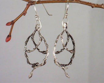 InterTWIGed Silver and Oxidized Silver Branch Earrings.
