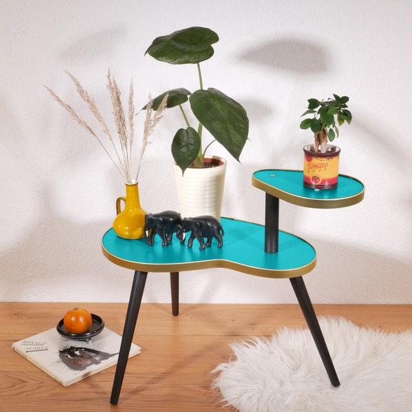 Stojaki na kwiaty w stylu vintage w różnych kolorach – design z lat 60.
