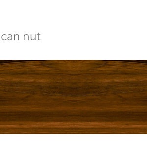 May include: A close-up of a dark brown wood grain surface. The wood has a rich, warm tone and a natural, rustic look.
