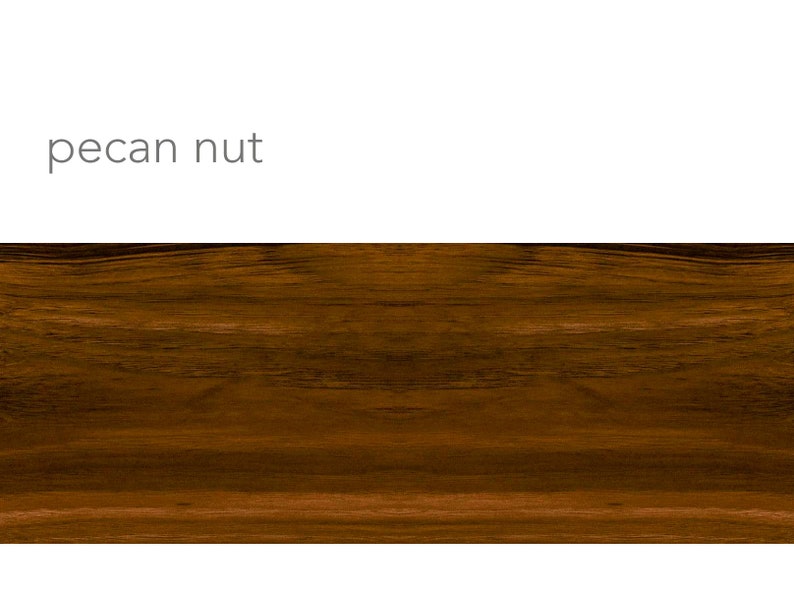 May include: A close-up of a dark brown wood grain surface. The wood has a rich, warm tone and a natural, rustic look.