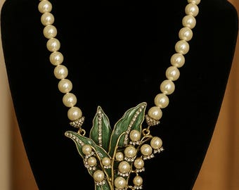 Conjunto de collar y pendientes de perlas de cristal con diseño de lirio de los valles, firmado por Heidi Daus, joyería floral de esmalte verde, diseño de inspiración vintage.