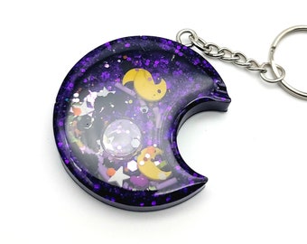 Porte-clés shaker lune violet scintillant : breloque d'Halloween effrayante