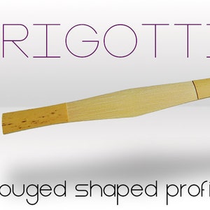 May include: A close-up of a light brown clarinet reed with a dark brown tip. The reed is labeled "RIGOTTI" and is described as "Gouged shaped profiled cane". The text "Collar Thickness: 90mm, 95mm, 100mm" is also visible in the image.