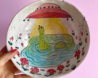 Hand-painted stoneware bowl with Loch Ness monster and pink UFO – handmade, unique and funny, perfect for snacks or appetizers